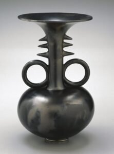 Magdalene Odundo, Symmetrical Reduced Black Narrow-Necked Tall Piece, 1990, terracotta. Courtesy Brooklyn Museum & Aware Women Artists